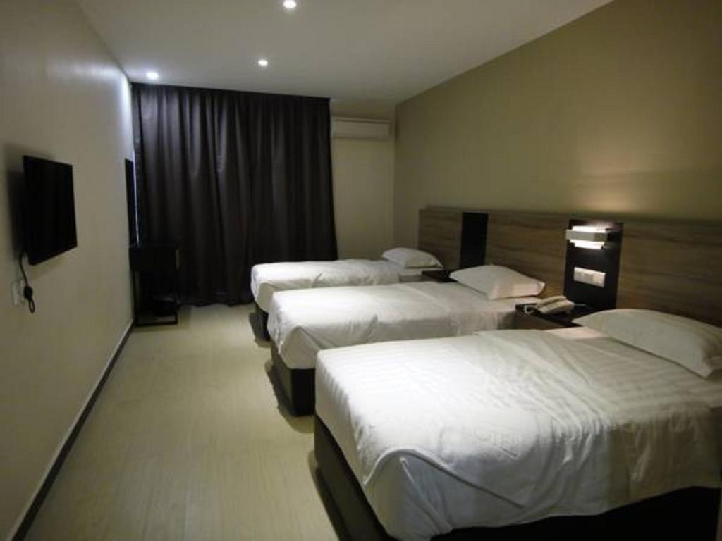 Galaxy Hotel Simpang Ampat  Rum bild