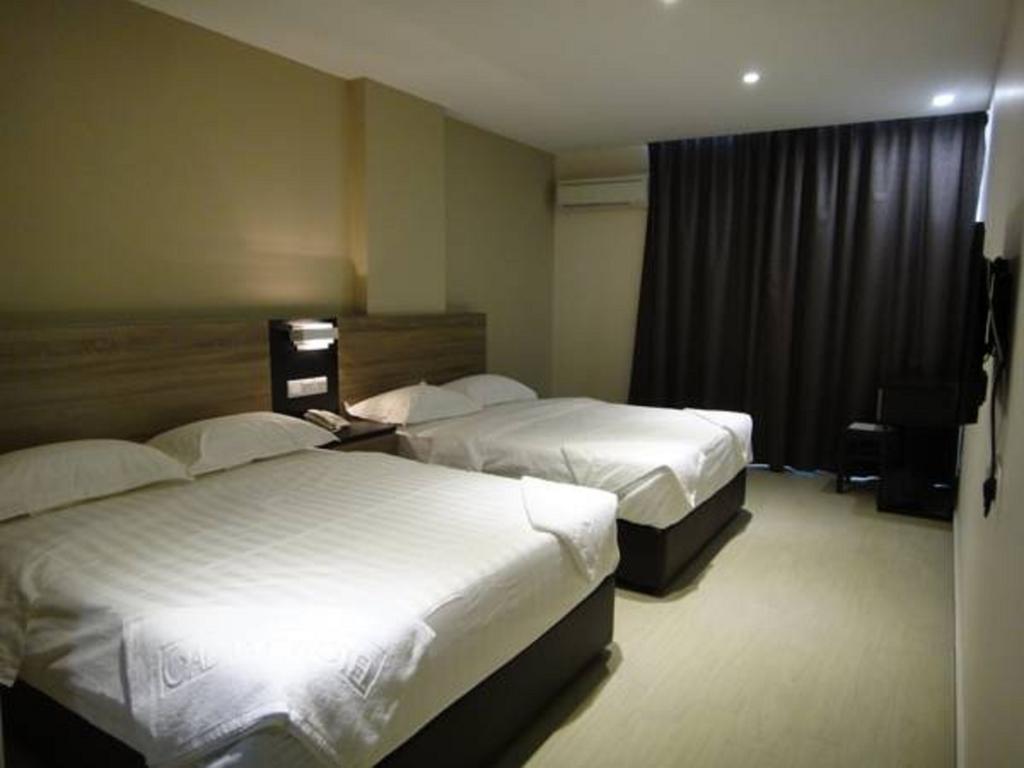 Galaxy Hotel Simpang Ampat  Rum bild